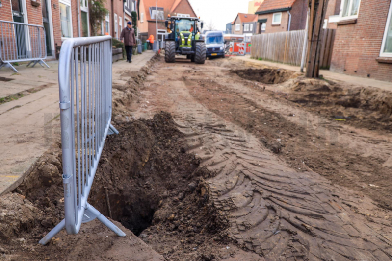 Waterlekkage in opengebroken straat (Amersfoort)