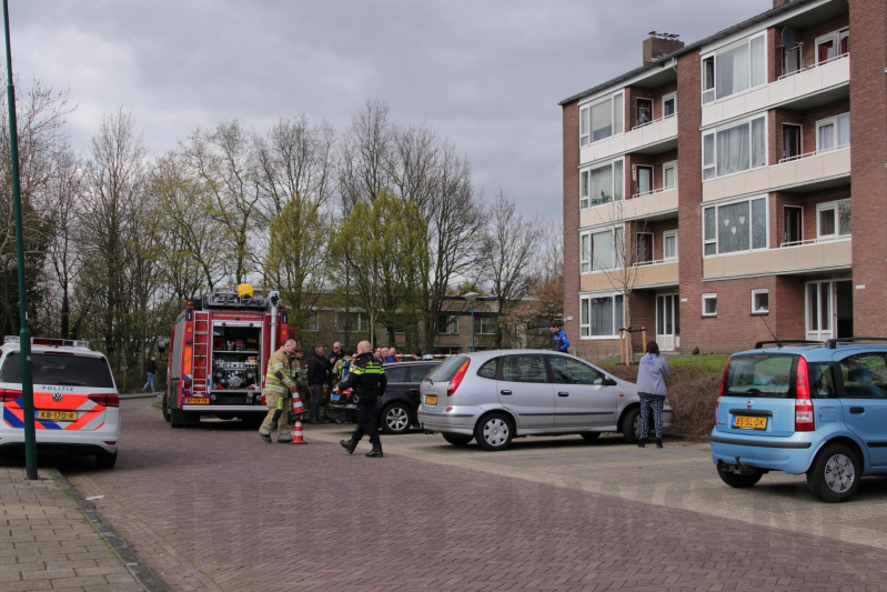 Tien flatwoningen kort ontruimd na brand in keuken
