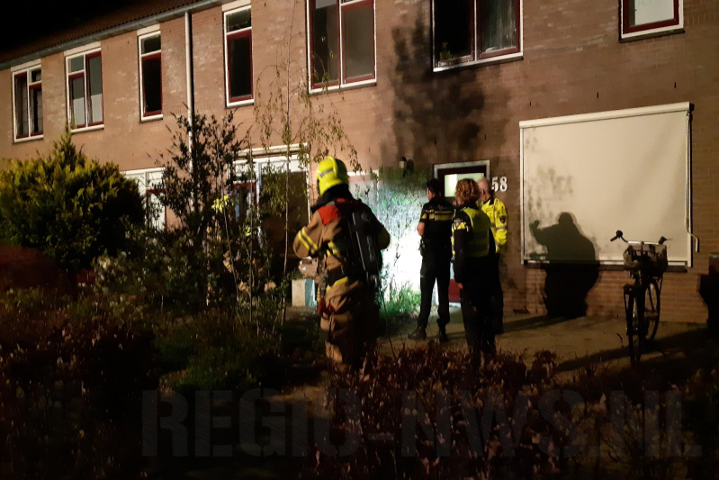 Woning vol rook door smeulende doeken