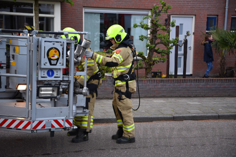 Brand in schoorsteen van woning