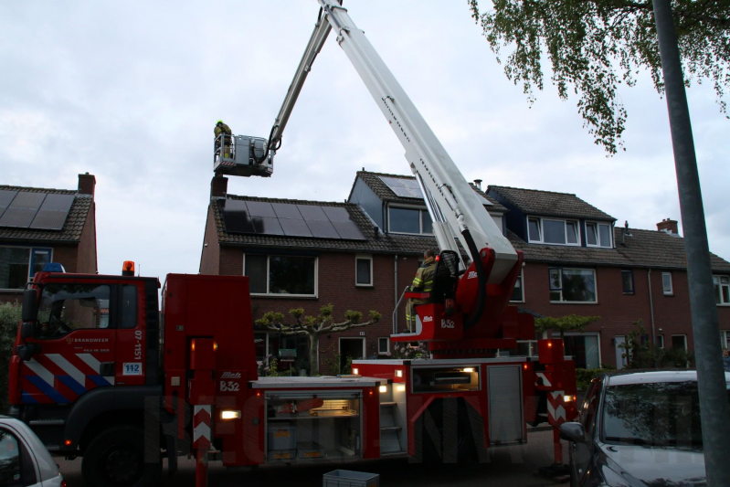 Brand in schoorsteen van woning