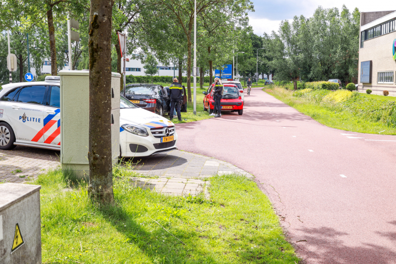 Schade na botsing op kruising