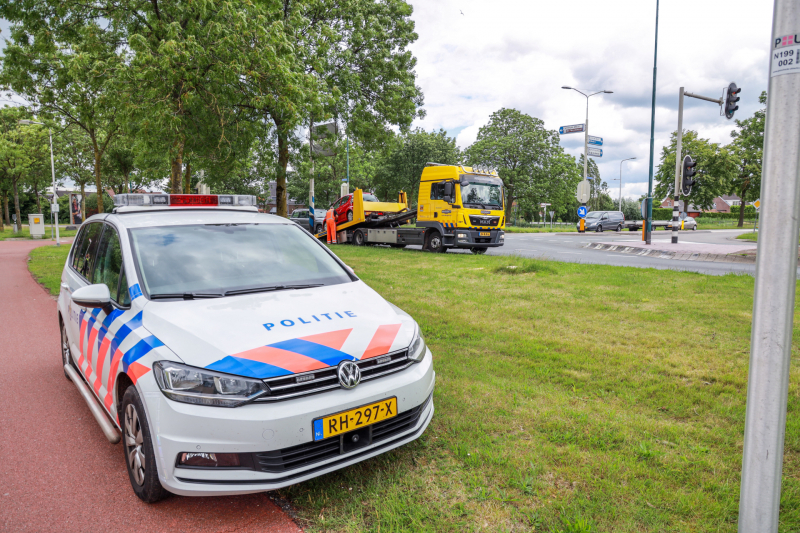 Schade na botsing op kruising
