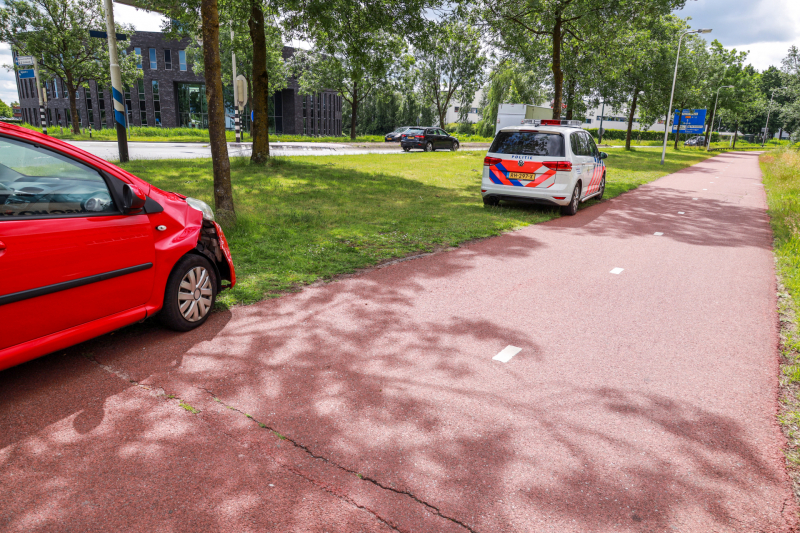 Schade na botsing op kruising