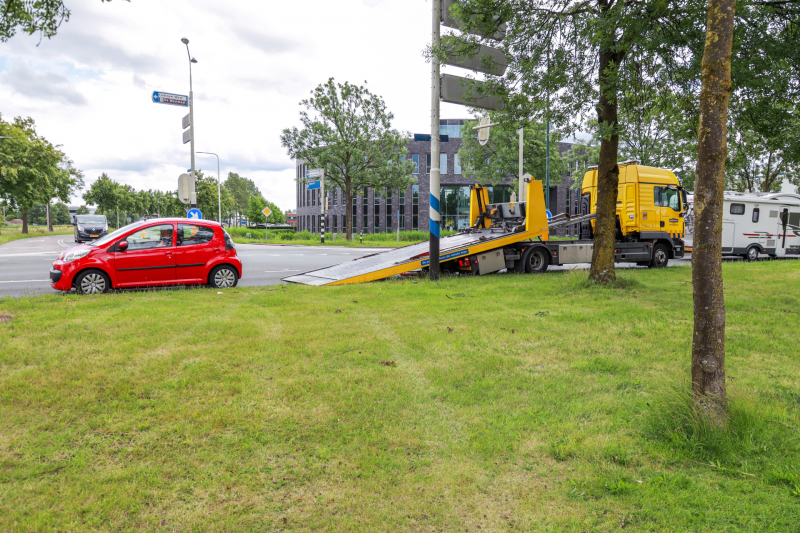 Schade na botsing op kruising