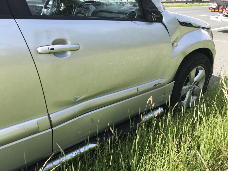 Schade na botsing met vrachtwagen