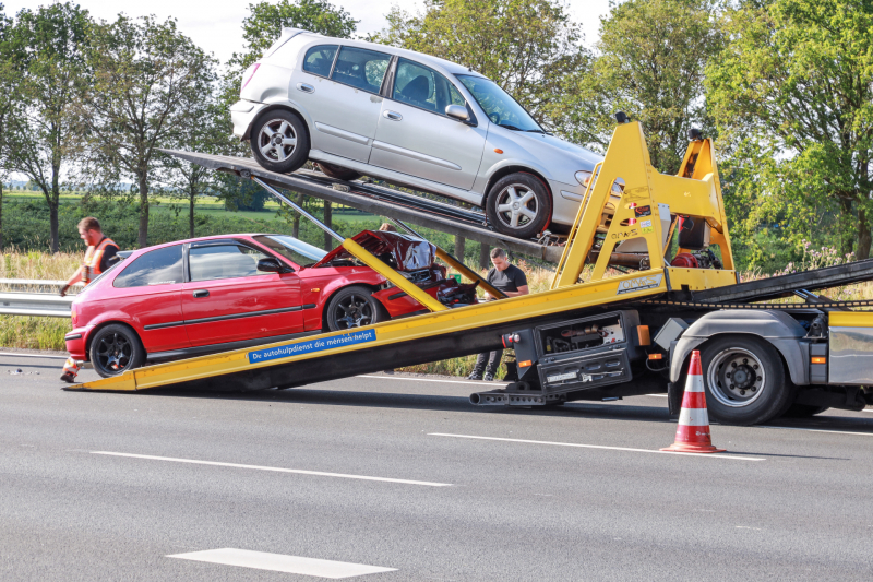 Drie auto's op elkaar