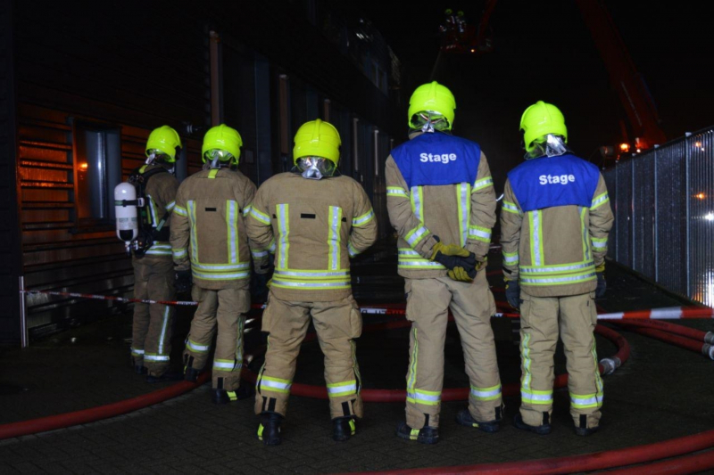 Negen woningen geÃ«vacueerd na brand in bedrijfspand