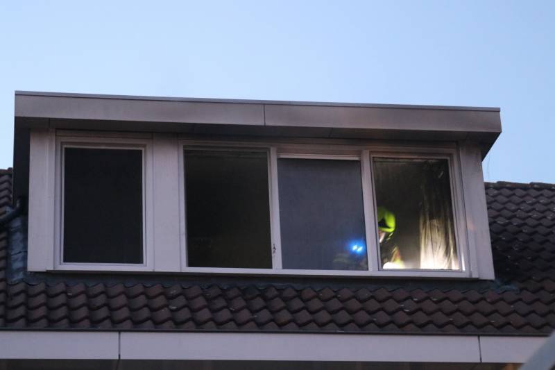Veel rook bij woningbrand