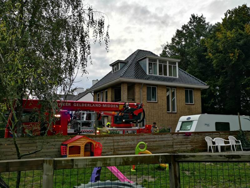 Brand in schoorsteen van woning