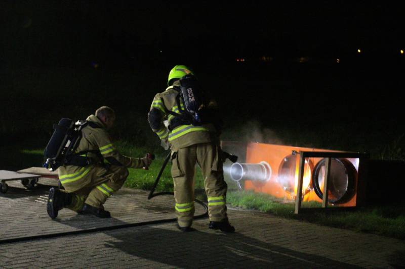 Brand bij houtbewerkingsbedrijf door broei