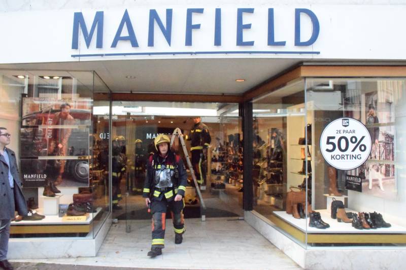 Brandlucht door smeulende transformator Manfield schoenenwinkel