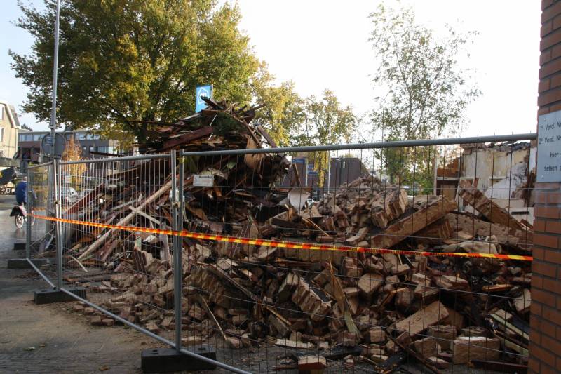 Trieste aanblik uitgebrande winkelpand