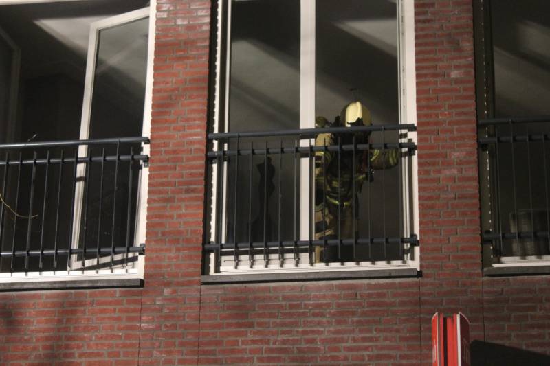 Brand door bouwlamp in appartement