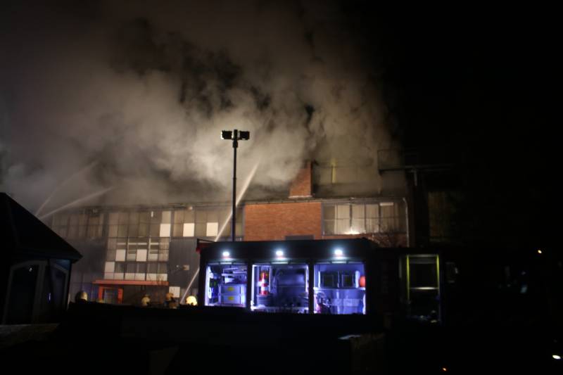 Grote rookwolken uit dak verpakkingsbedrijf PilloPak