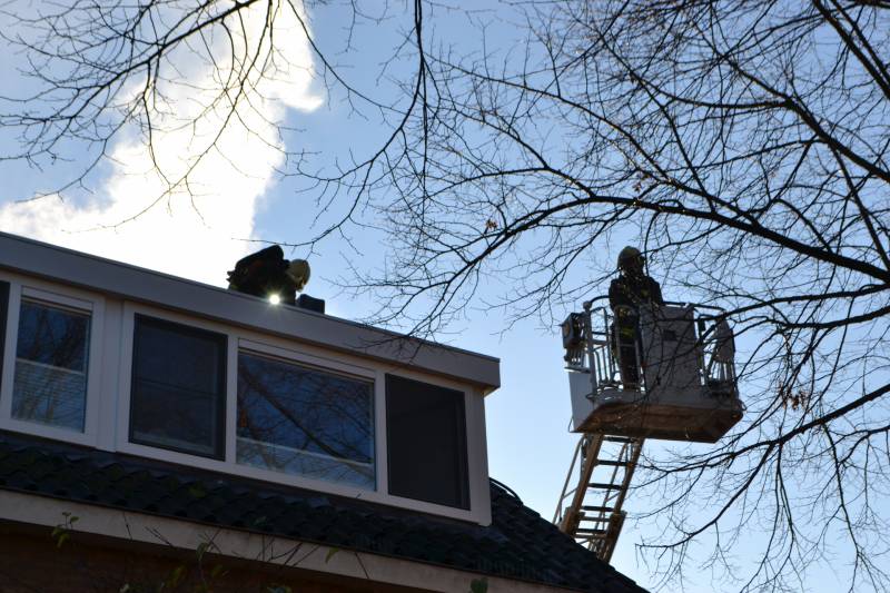 Fikse schoorsteenbrand in Binnenhof lastig te bereiken