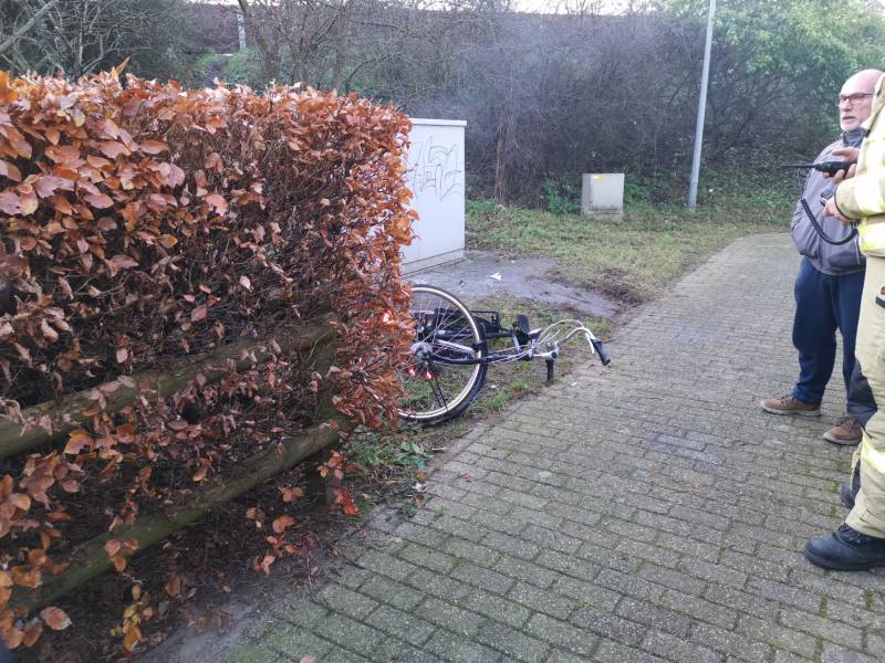 Achterband fiets in brand