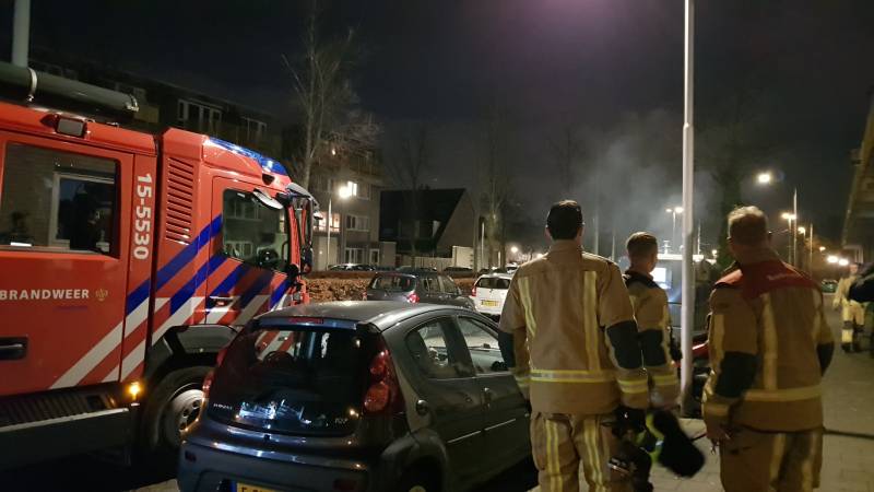 Brandweer blust brand in container