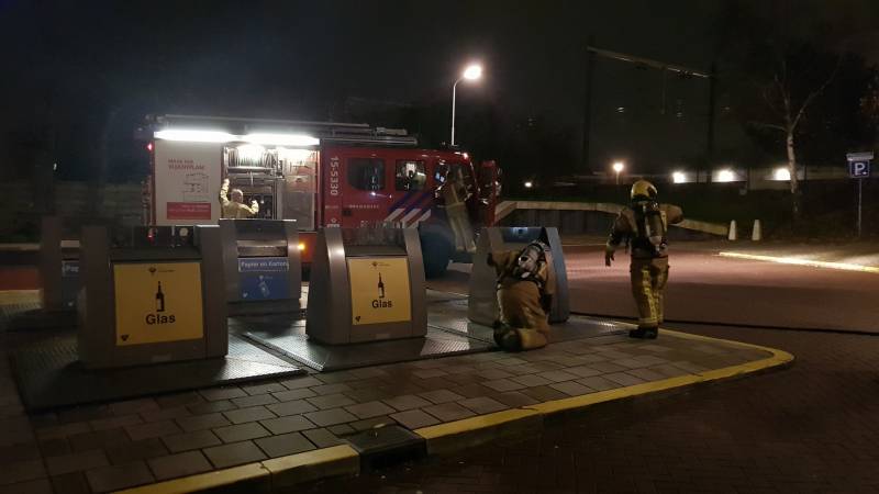 Brandweer druk met containerbrand