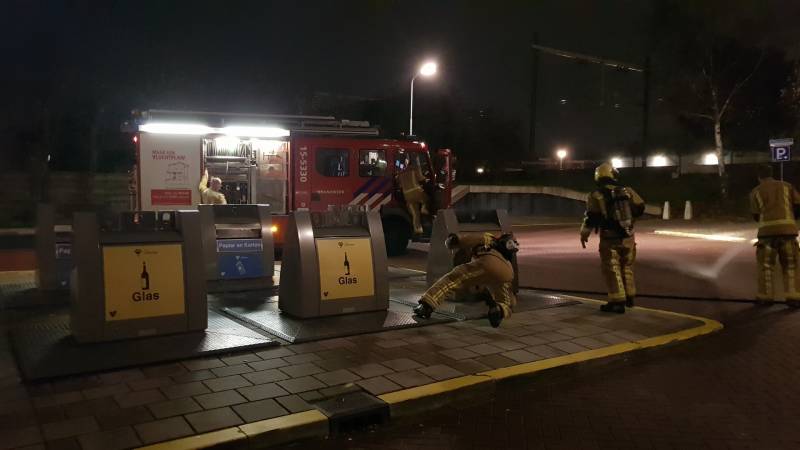 Brandweer druk met containerbrand