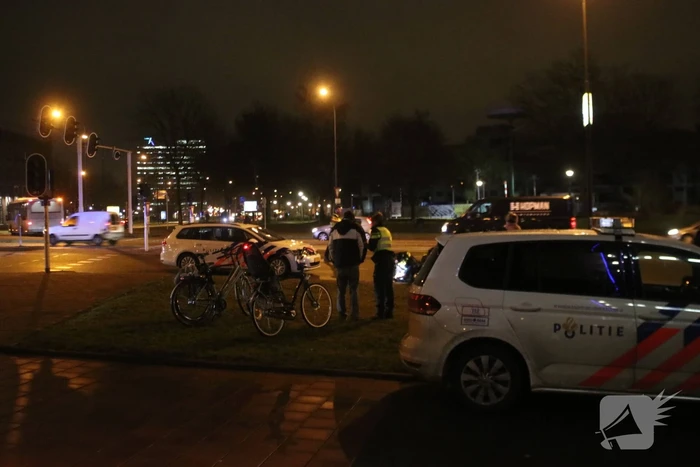 Fietsers aangereden door politieauto