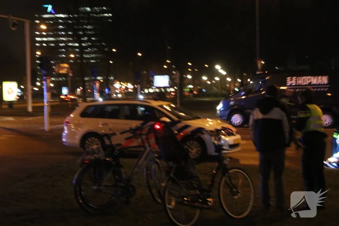 Fietsers aangereden door politieauto