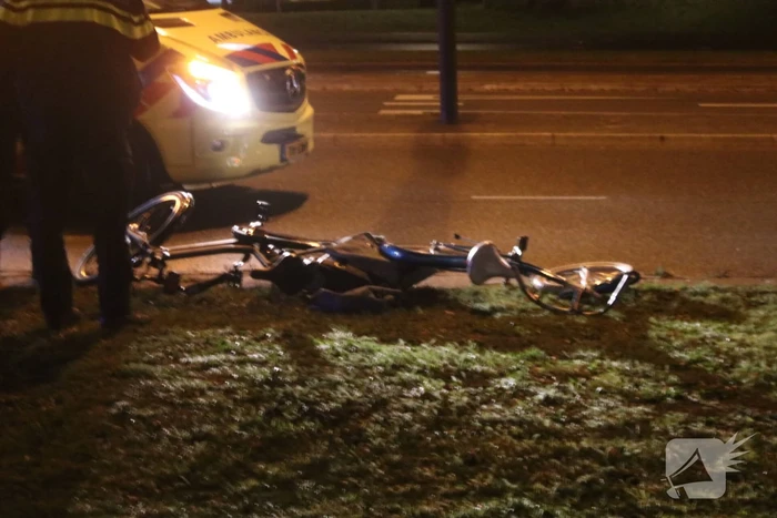 Fietsers aangereden door politieauto