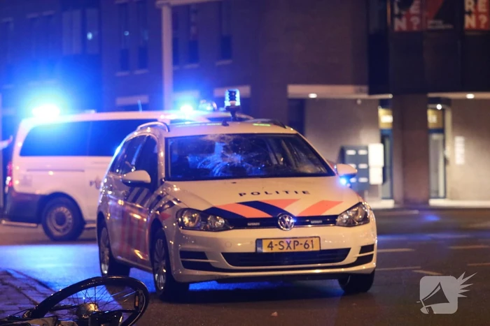 Fietsers aangereden door politieauto