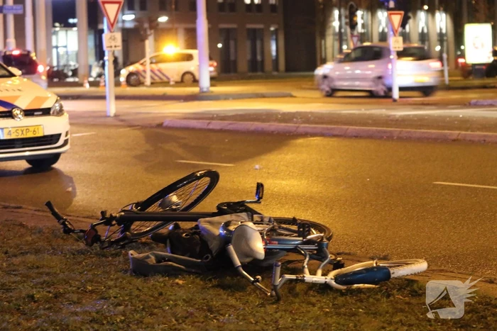 Fietsers aangereden door politieauto