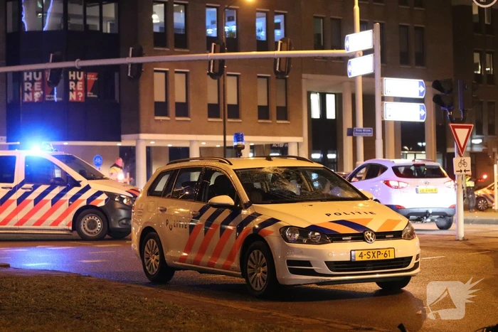 Fietsers aangereden door politieauto