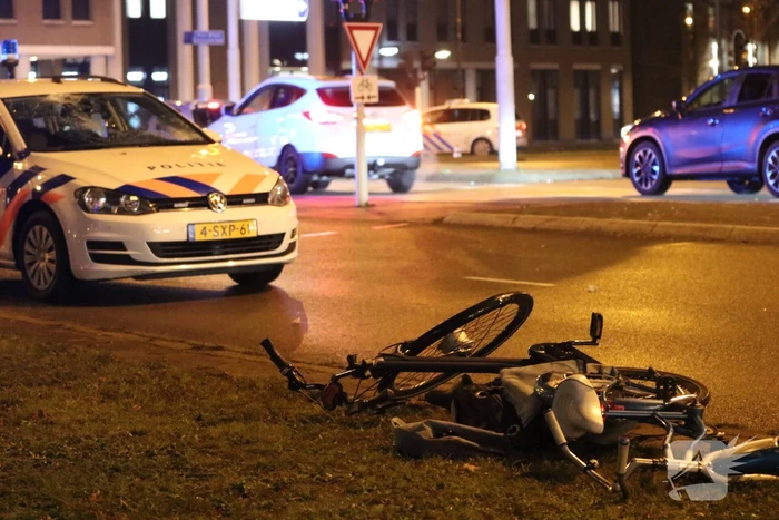 Fietsers aangereden door politieauto