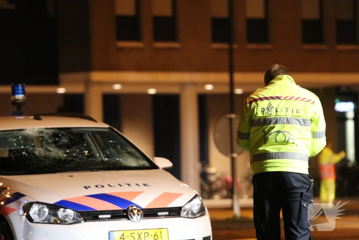 Fietsers aangereden door politieauto