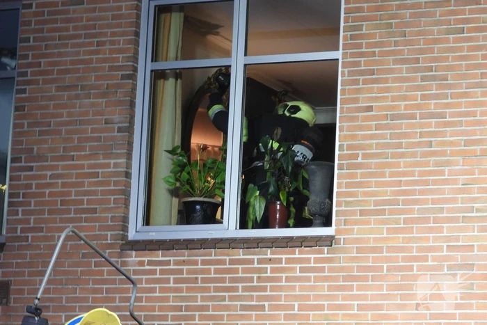 Brand in schoorsteen bovenwoning winkelpand