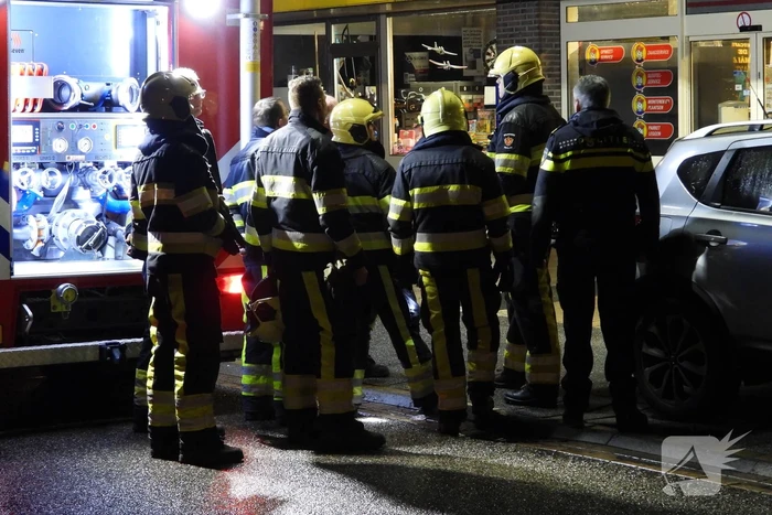 Brand in schoorsteen bovenwoning winkelpand