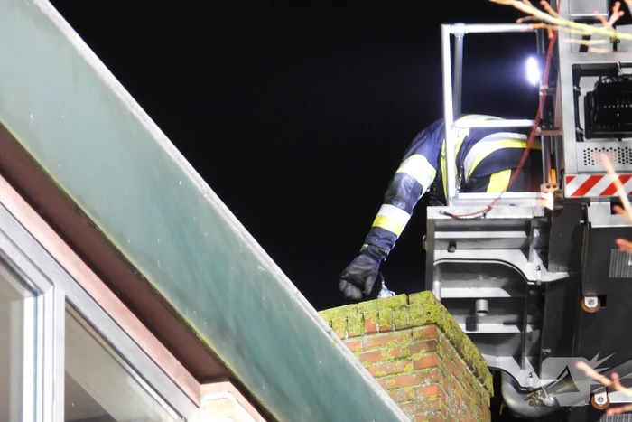 Brand in schoorsteen bovenwoning winkelpand