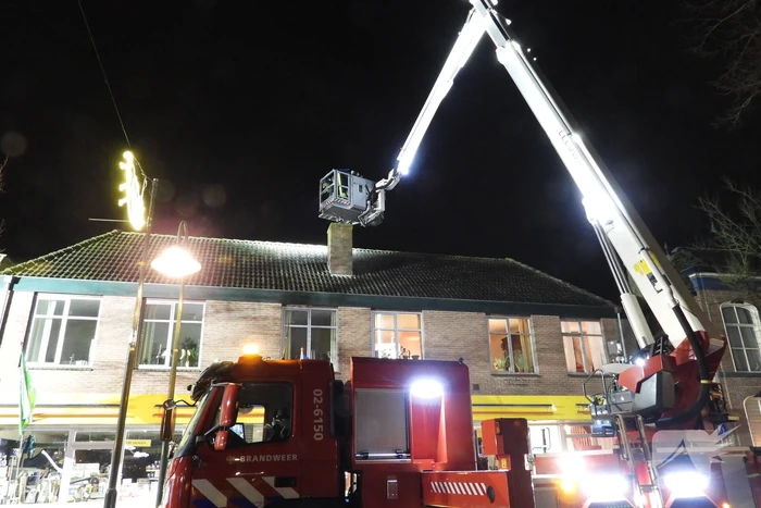 Brand in schoorsteen bovenwoning winkelpand