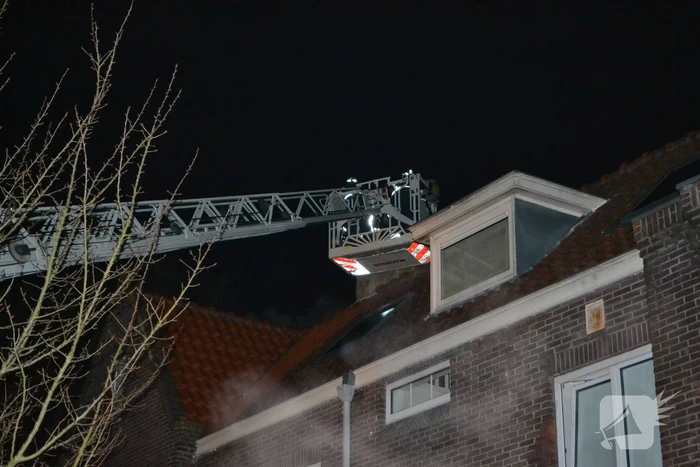 Brand in schoorsteen van woning