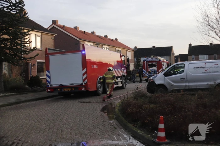 Brand in schuur achter woning