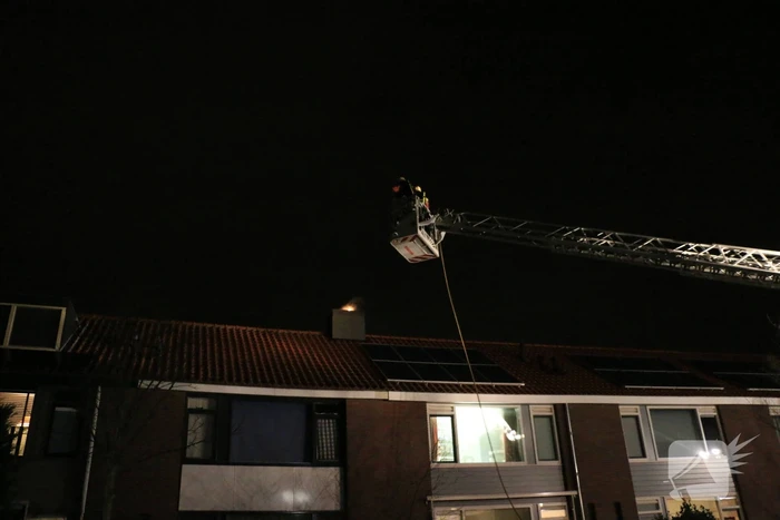 Flinke brand in schoorsteen geblust