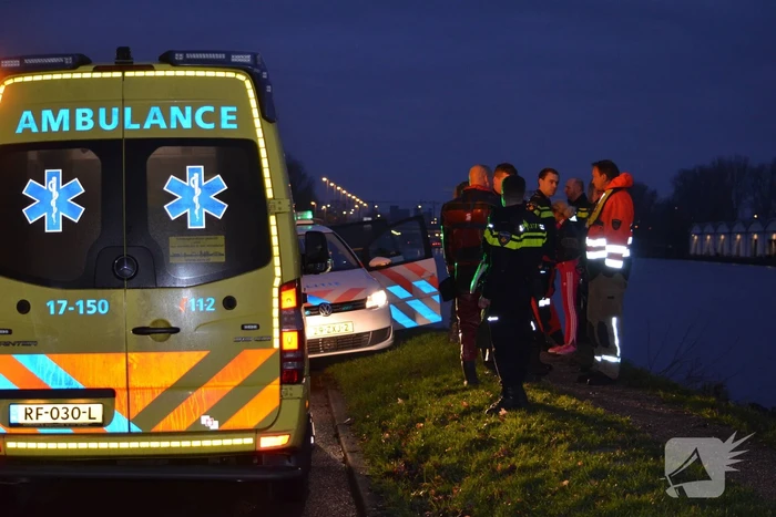 Persoon te water geraakt in kanaal