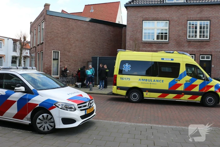 Persoon in scootmobiel ten val