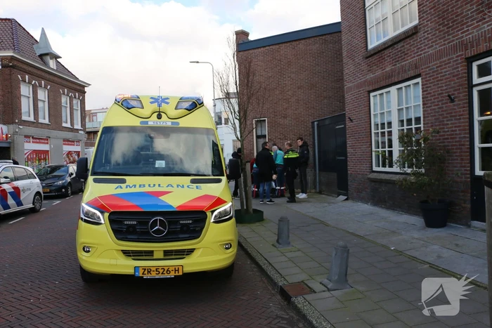 Persoon in scootmobiel ten val