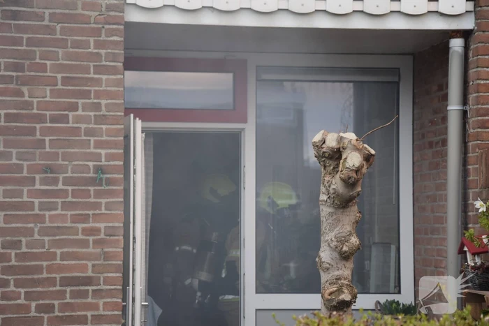 Geiser in woning vat vlam