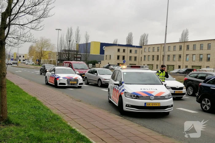 Schade bij kop-staart botsing voor stoplicht