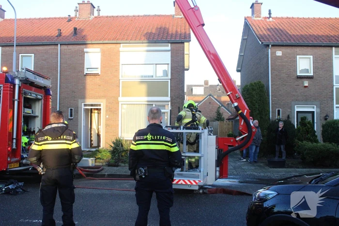 Veel rook bij schoorsteenbrand