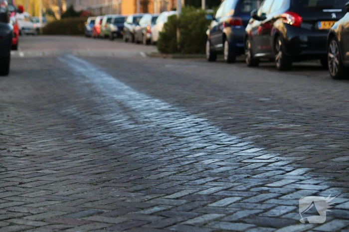 Straat besmeurd met olie