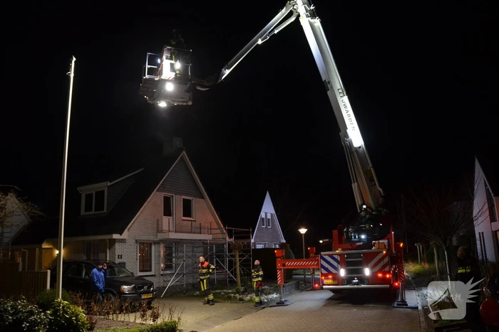Brand in schoorsteen van woning