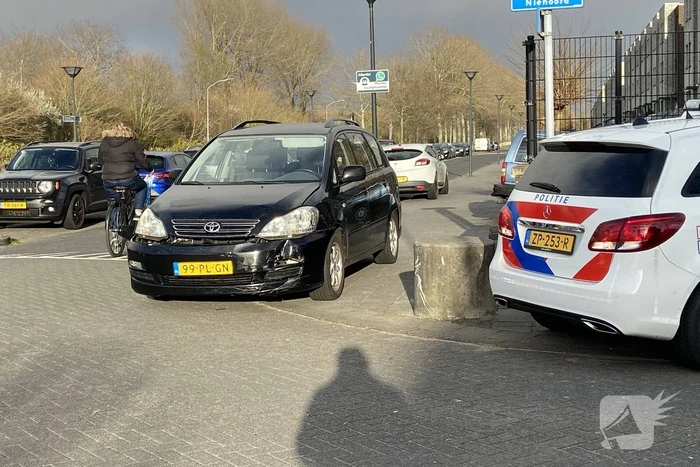 Aanrijding tussen bestelscooter en personenauto