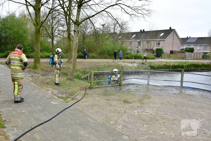 Houtwerk damwand vat vlam