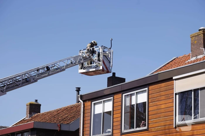 Woning vol rook bij brand in schoorsteen